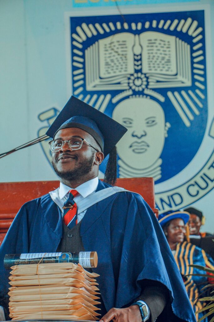 Graduate in cap and gown at a Nigerian university graduation ceremony, the profile Commonwealth Scholarships fund